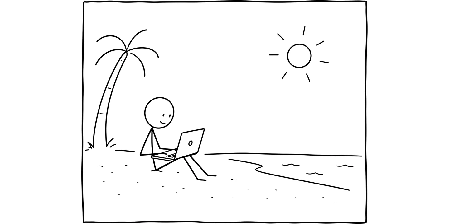 A person working from a laptop on a beach under the sun